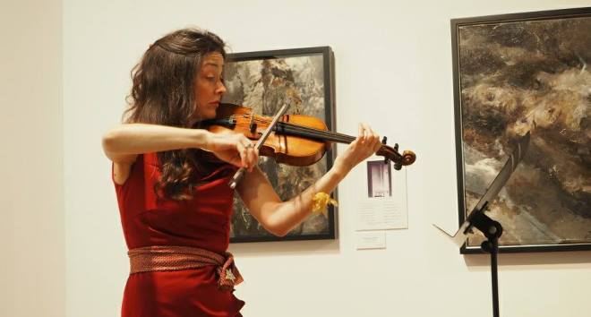 Ms. Lina Tur Bonet plays at the Opening Ceremony site.